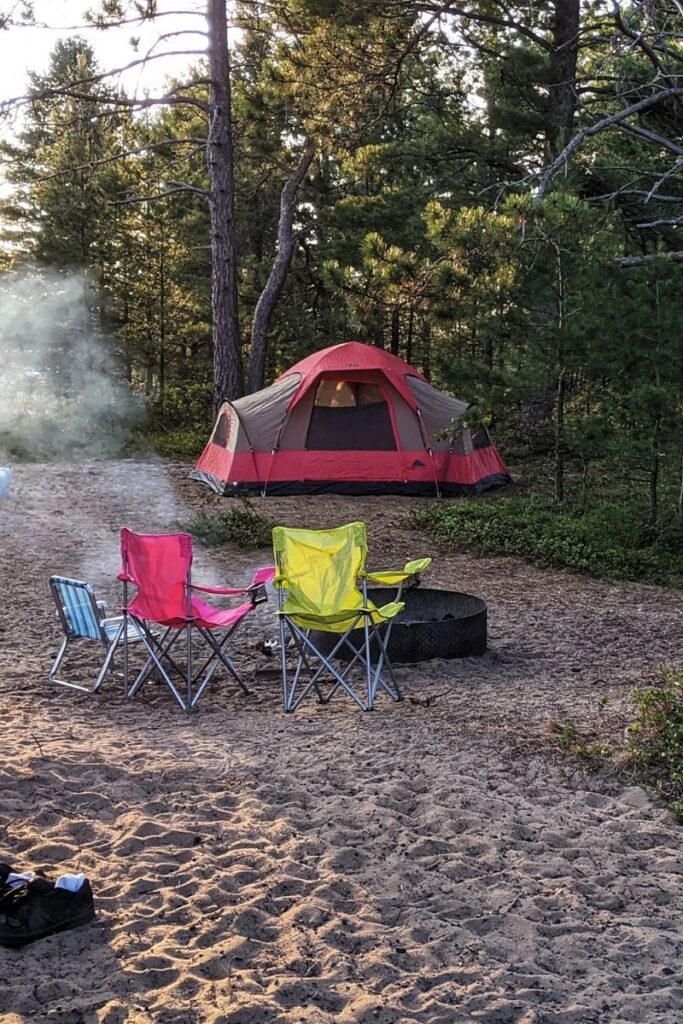 Tent campsite on a sandy beach damages gear