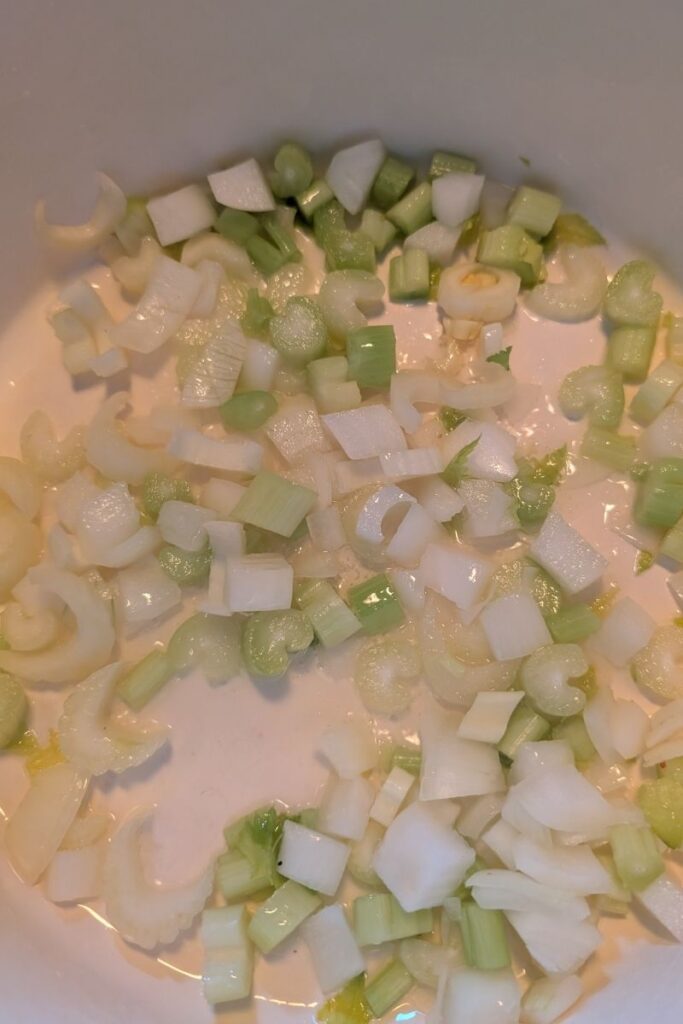 Sauteing the onions and celery for the easy white bean chicken chili